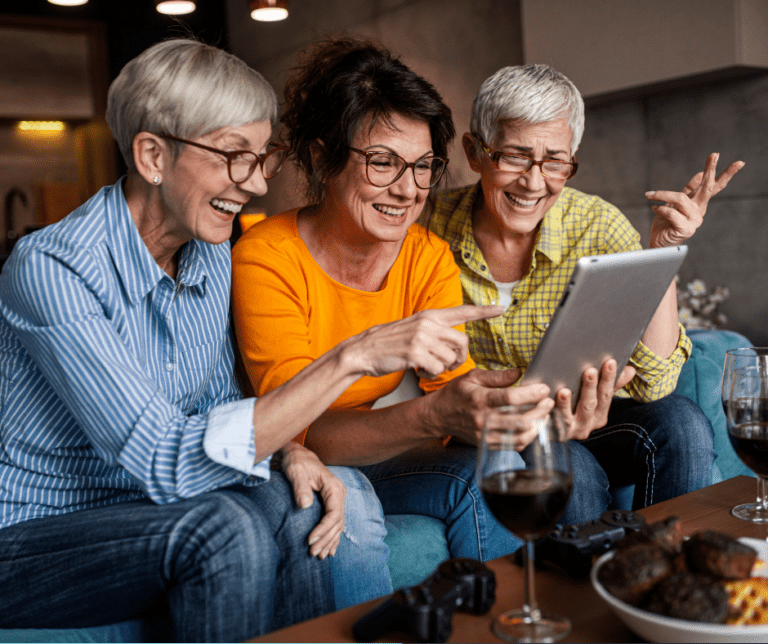 Photo Digitizer Customers looking at photos on a tablet